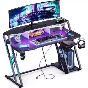 BALHAM TRADE-48 Inch Gaming Desk with Power Outlet LED Lights Carbon Fiber Texture PC Storage Shelf